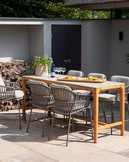 4 Jahreszeiten Outdoor Capalbio High Dining Chair + Taste 4so Liam High Ess Tisch mit Keramikblatt 220 cm